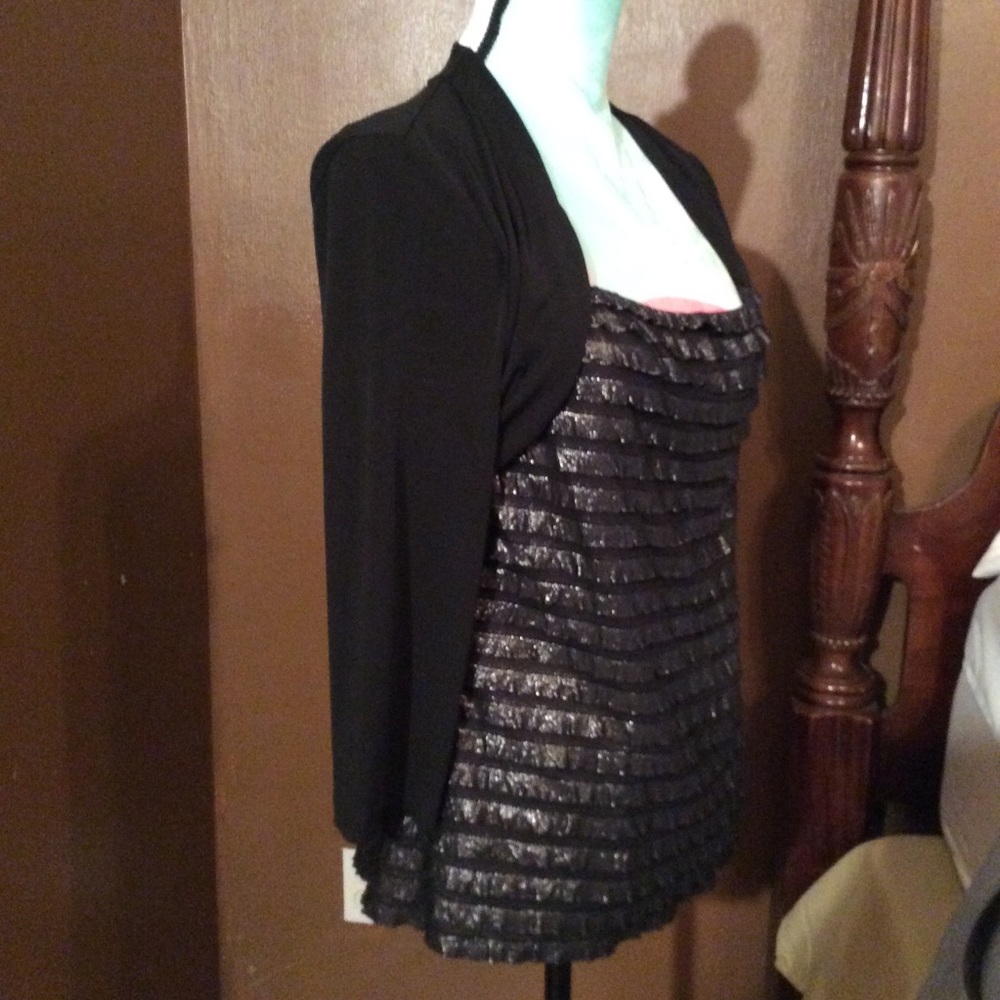 Fancy black top with attached jacket.